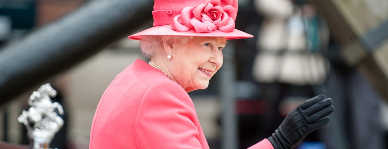Queen Elizabeth II waving in Liverpool.