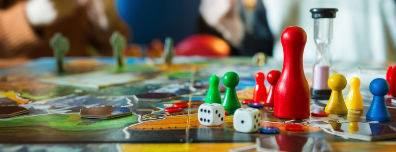 A close-up of a board game on a table.
