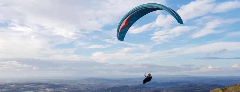 A person hang gliding.