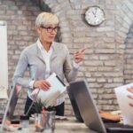 A group of colleagues sitting around a conference table.
