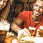 Friends having a drink in the pub.