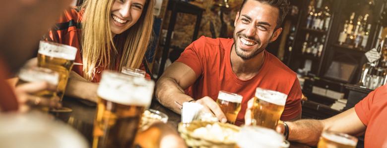 Friends having a drink in the pub.