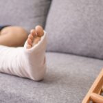A person with a cast on their leg.